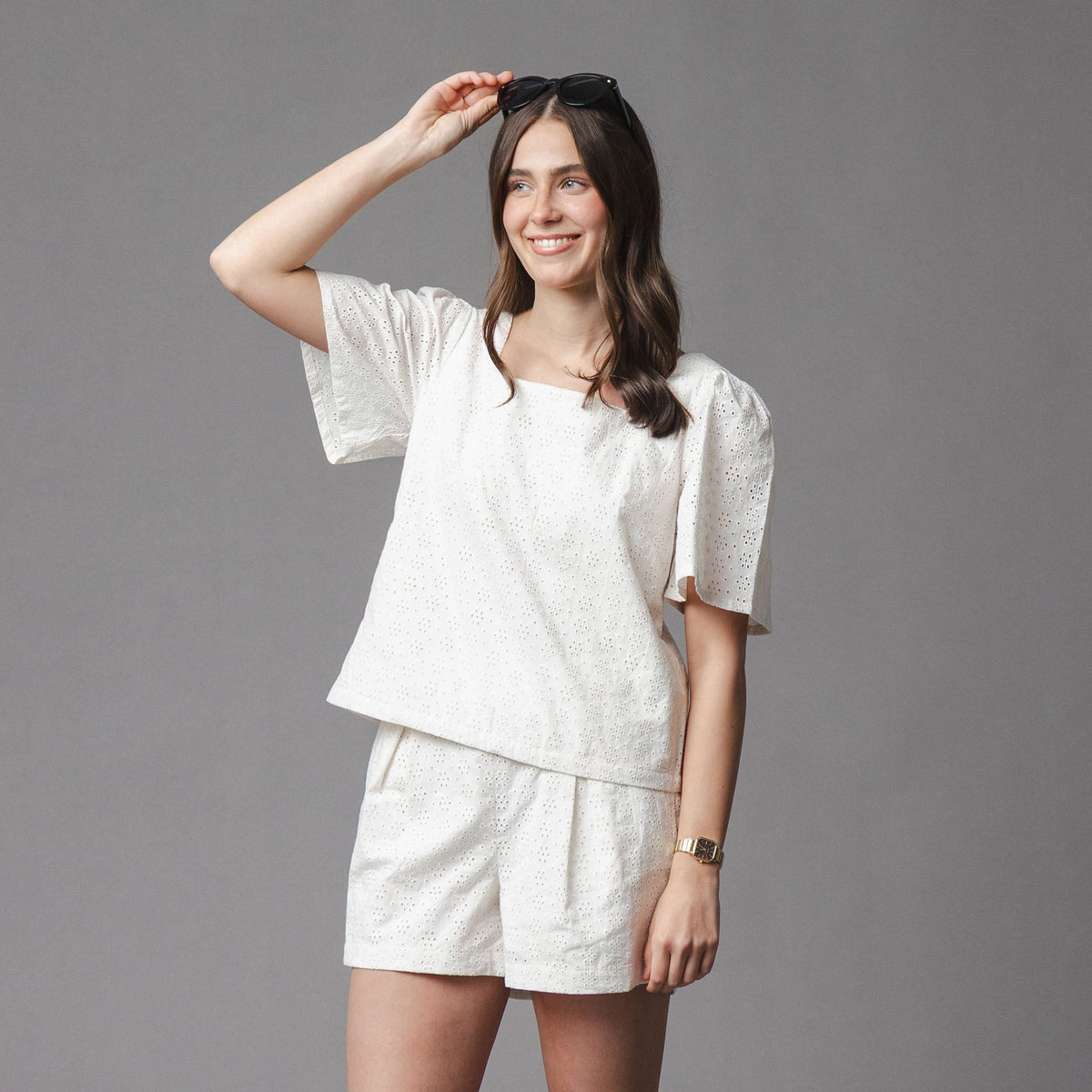 Organic Eyelet Button Tab Short in Natural Eyelet — back view