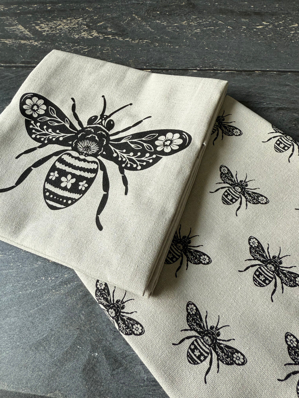 Bee tea towel close-up showing the woven linen-cotton fabric