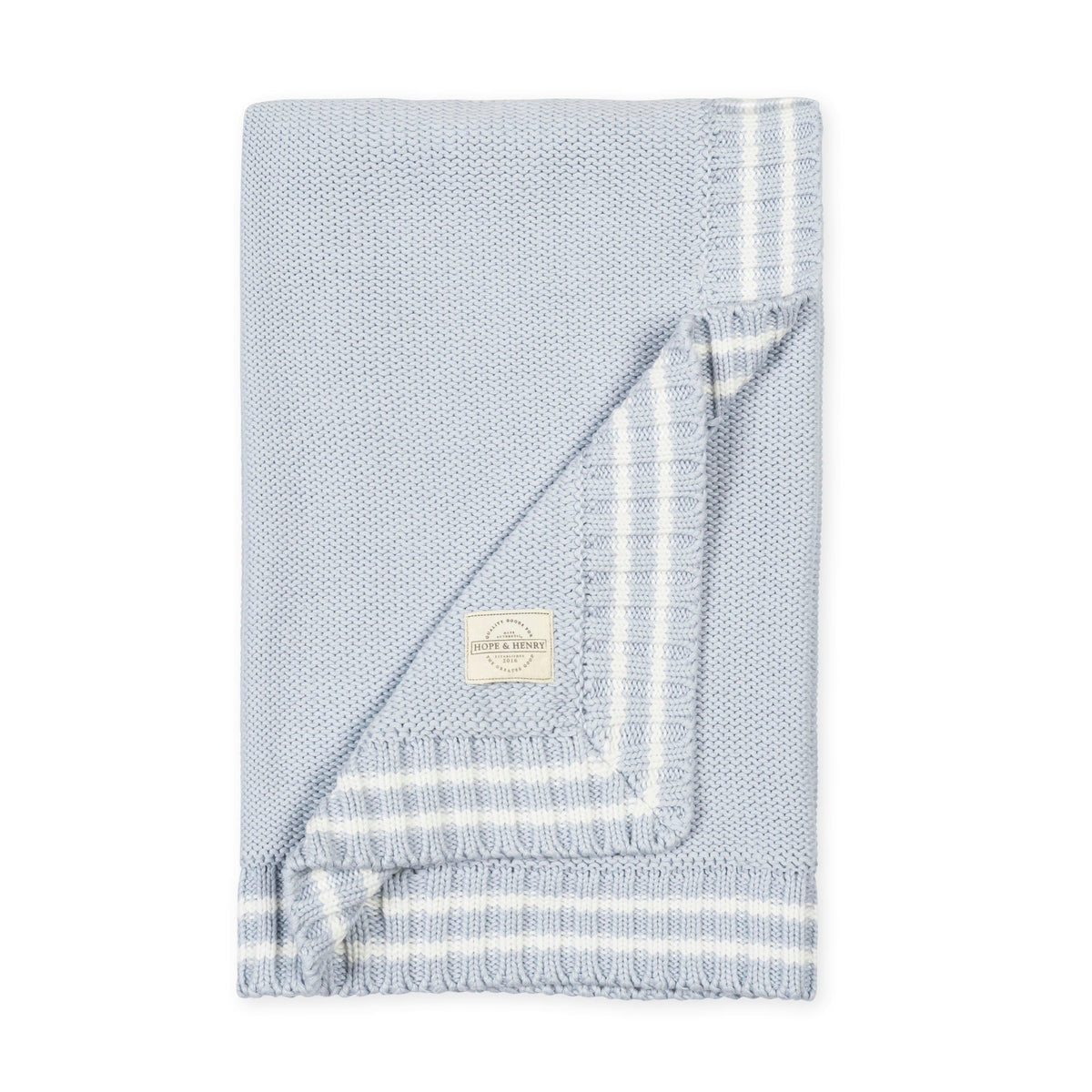 Organic Cable Knit Blanket in Pale Blue Stripe — styled flat