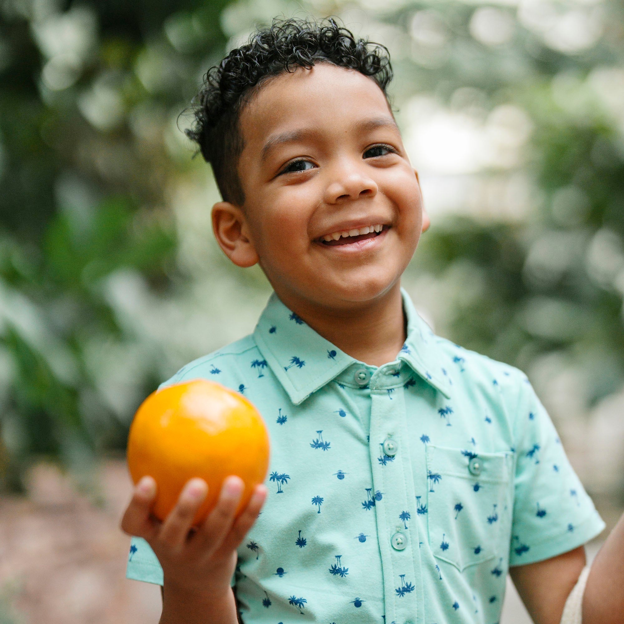 Organic Jersey Button Down Shirt in Tidal Palm Print — lifestyle photo