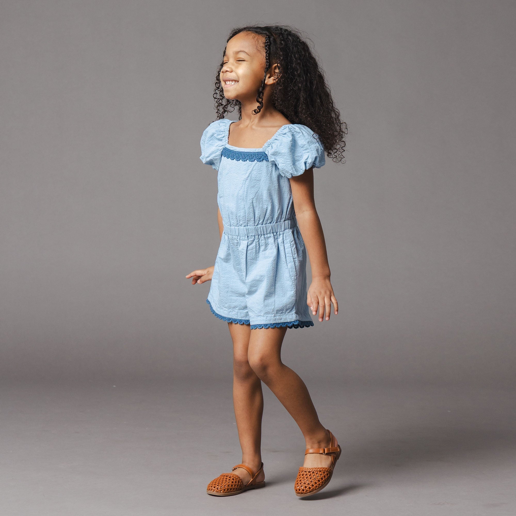 Organic Puff Sleeve Seersucker Romper in Bluebell — front view