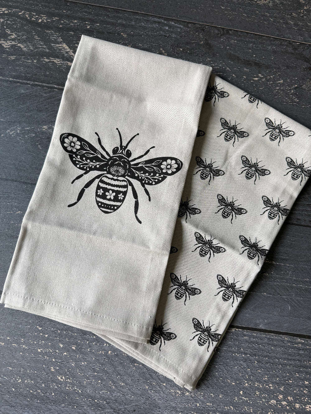 Five Oaks Farm bee hand towels folded in a kitchen