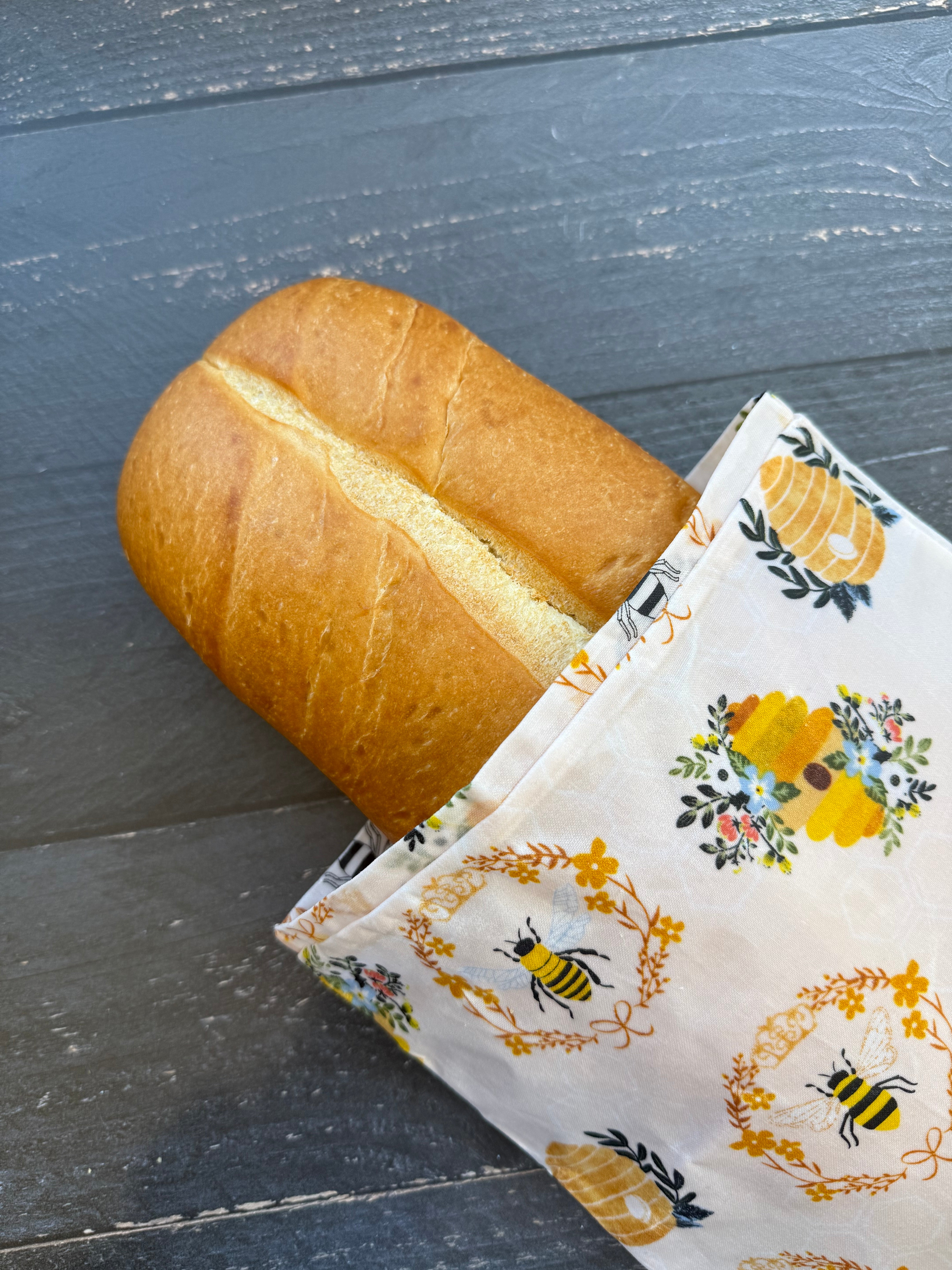 Organic cotton beeswax baguette bag wrapping a baguette