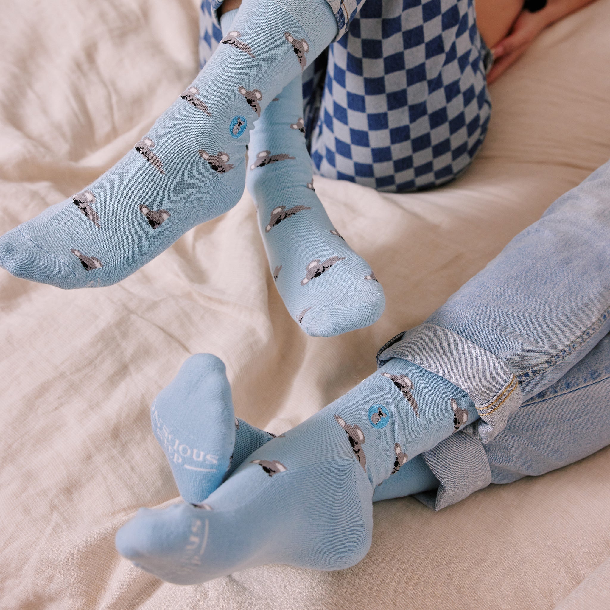 Socks that Save Koalas by Conscious Step — organic cotton crew socks with a sleeping koala design