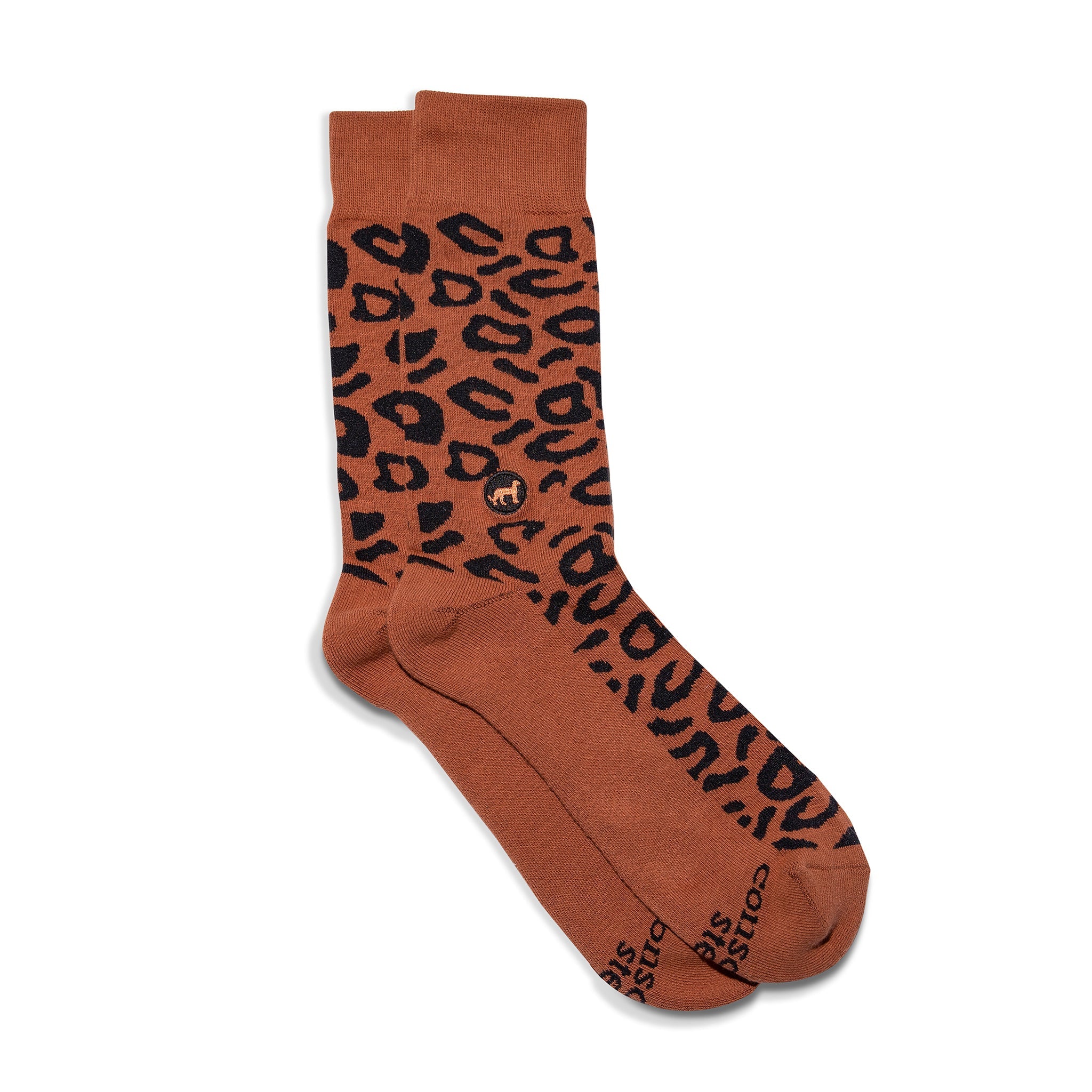 Socks that Protect Cheetahs by Conscious Step — rust and black leopard-inspired organic cotton crew socks