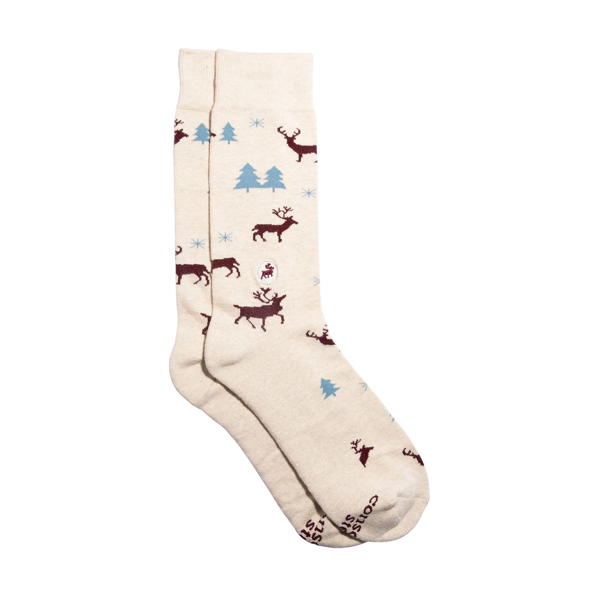 Socks that Protect Caribou by Conscious Step — cream organic cotton crew socks with reindeer and trees