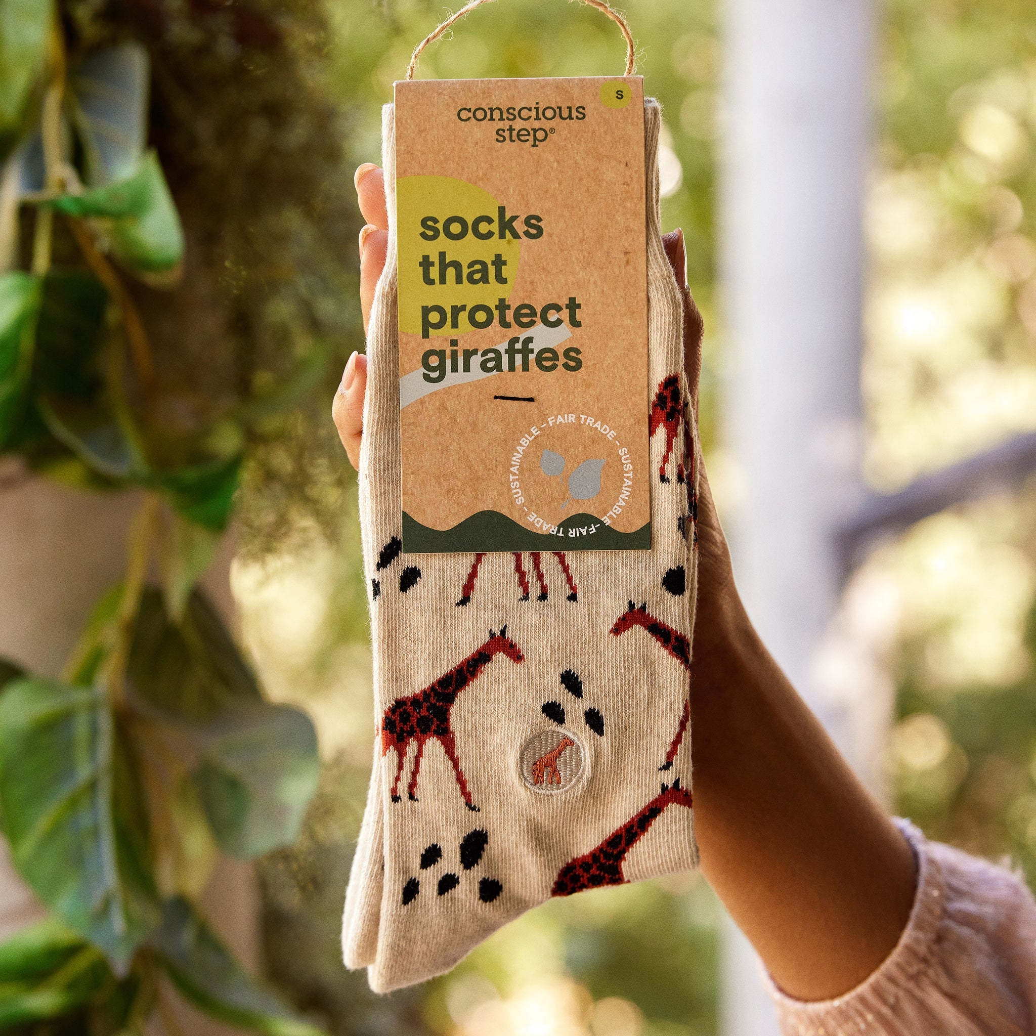 Close-up of giraffe sock pattern — Conscious Step