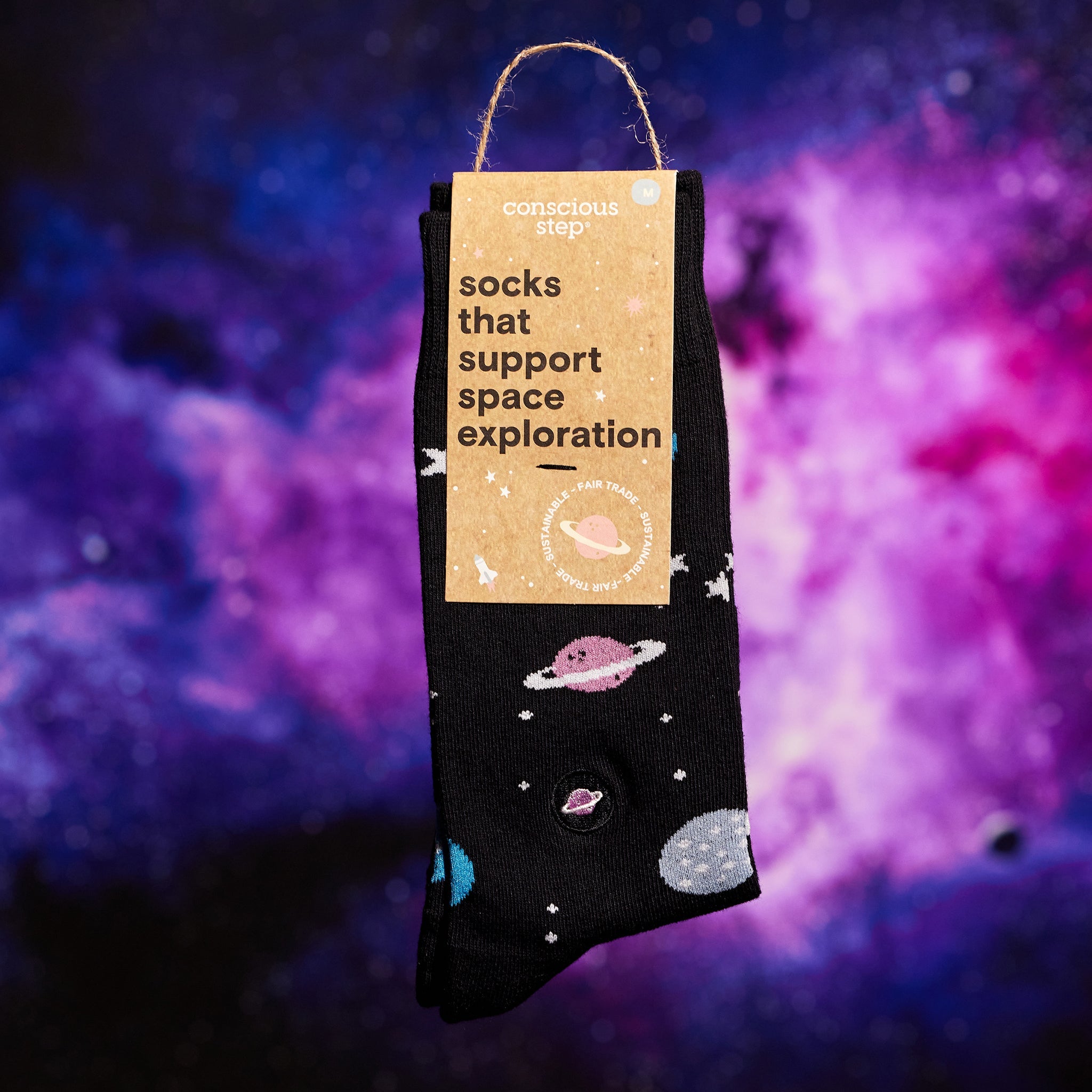 Close-up of galaxy sock pattern — Conscious Step