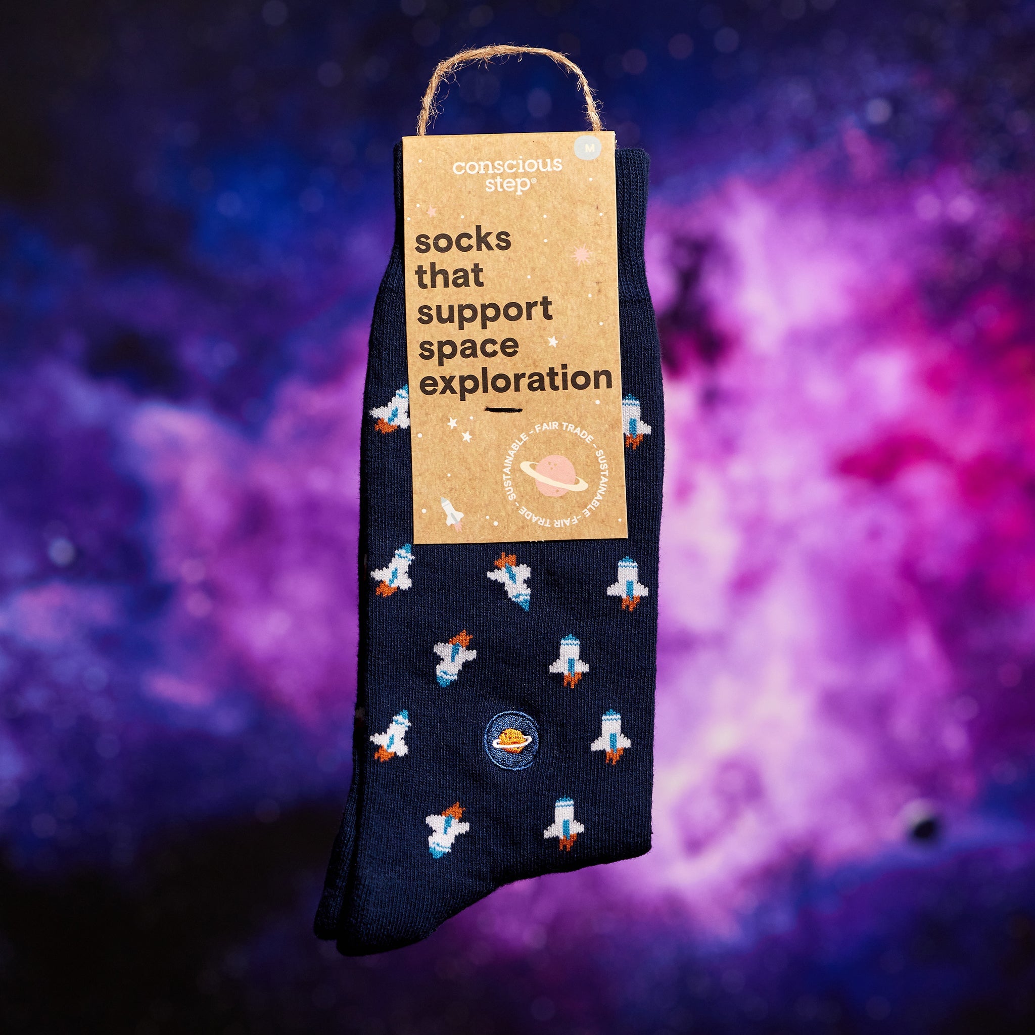 Close-up of rocket-ship sock pattern — Conscious Step