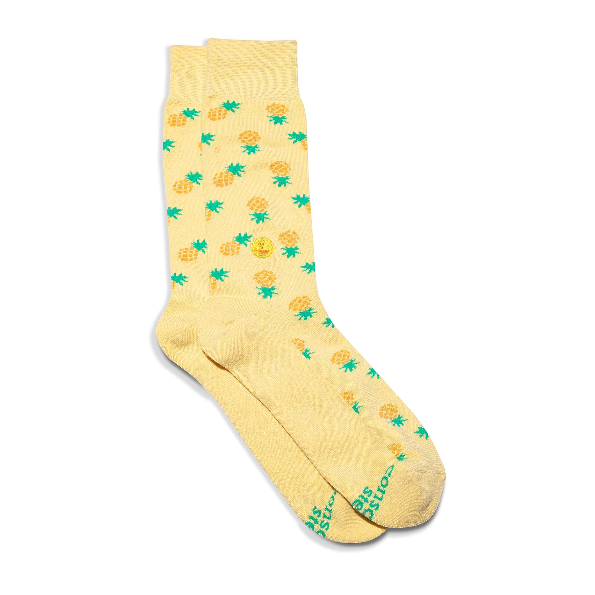 Socks that Provide Meals by Conscious Step — bright yellow pineapple organic cotton crew socks