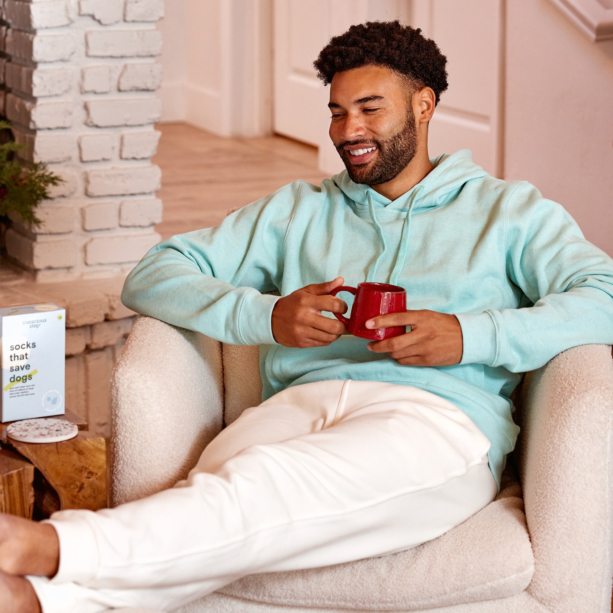 Protect Rainforests organic cotton hoodie in aqua blue — Conscious Step