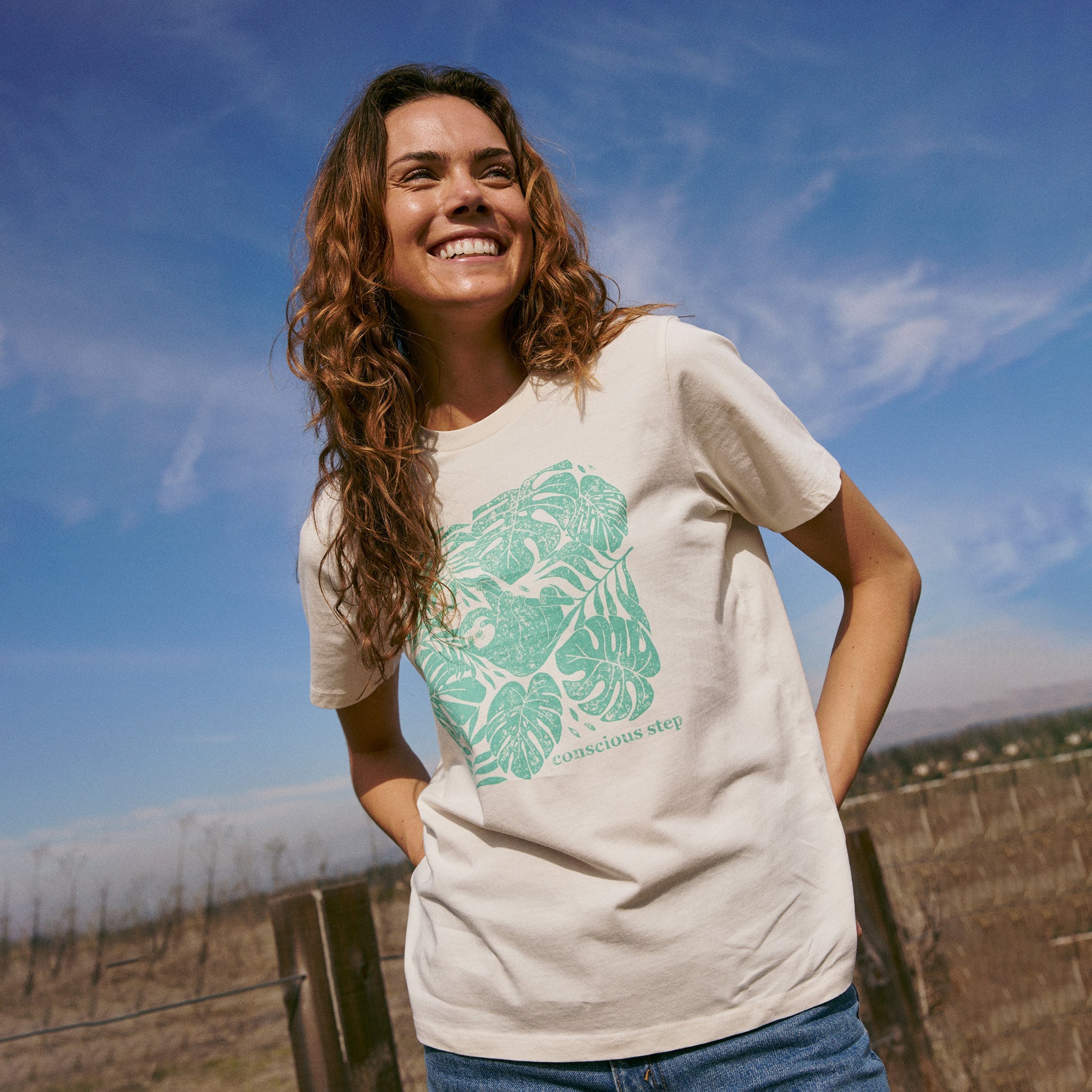 Unisex organic cotton sloth t-shirt, model wearing size large — Conscious Step
