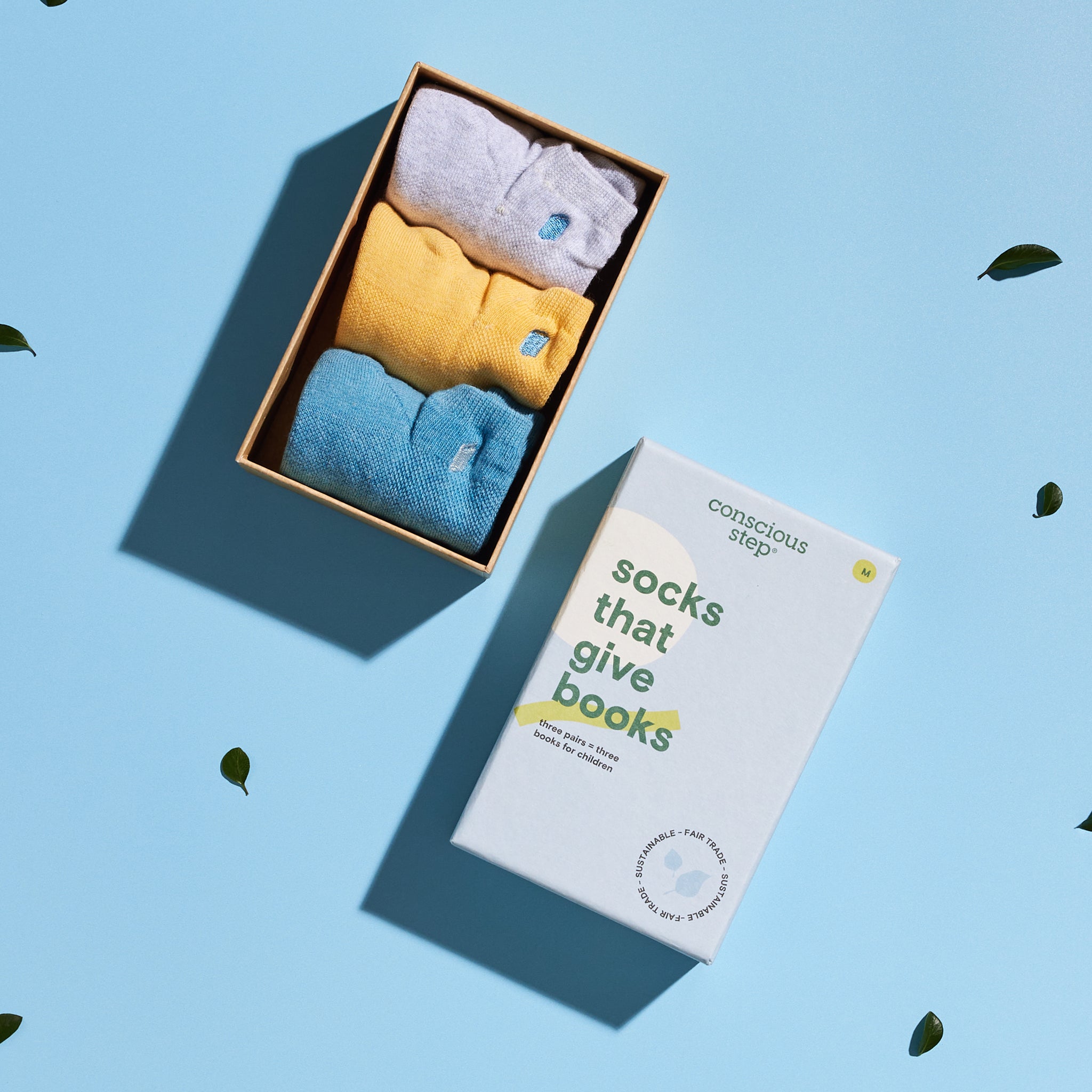 Socks that Give Books 3-pack — organic cotton socks in gray, yellow & blue, book embroidery