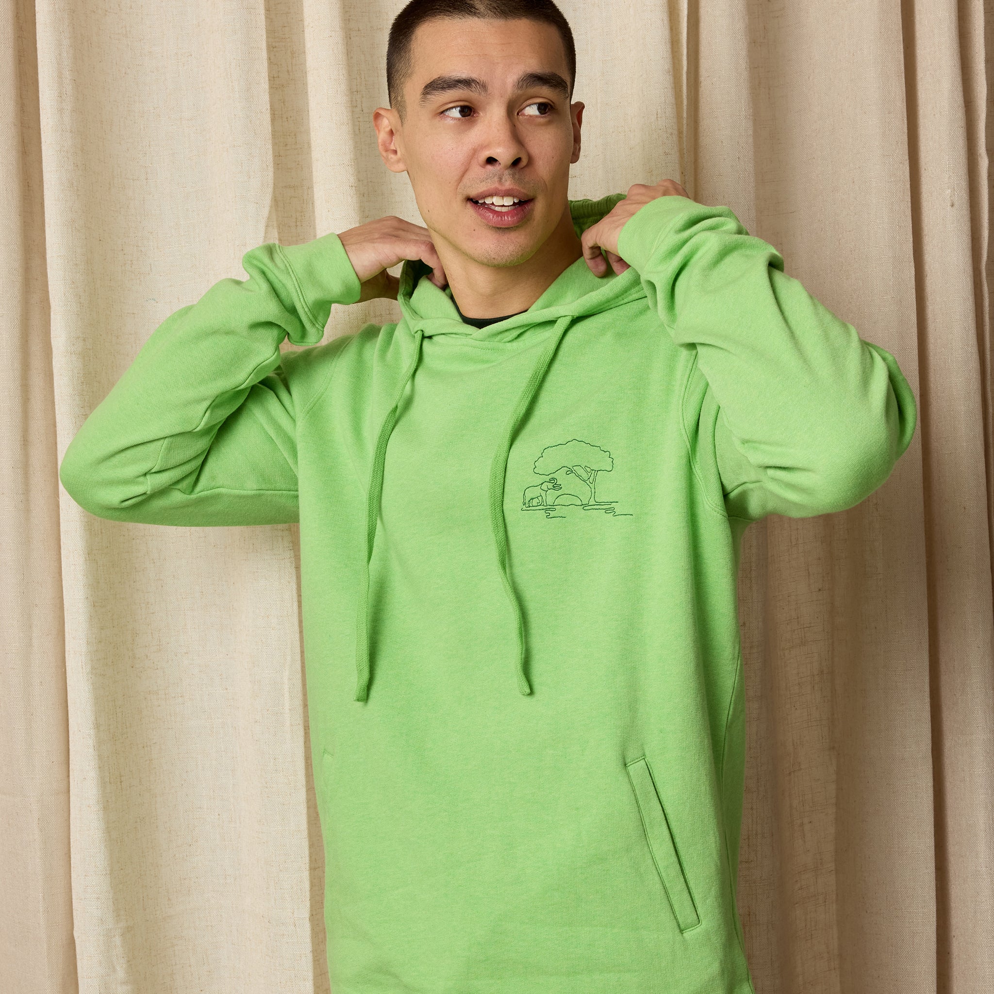 Green hoodie with elephant embroidery — Conscious Step